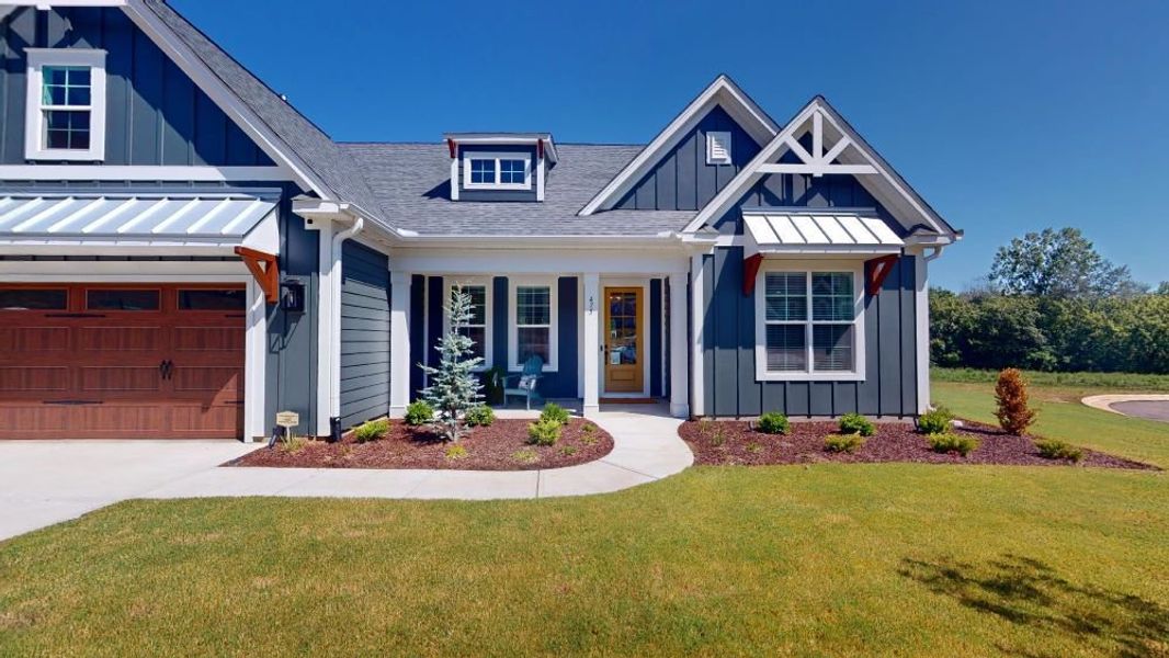 2 story home with a first floor main bedroom