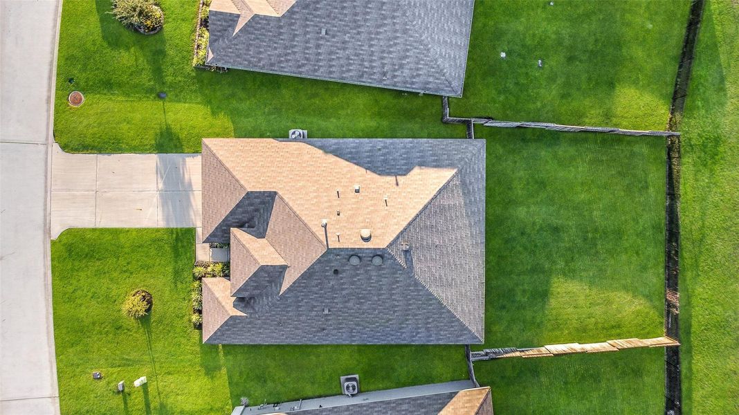 Exterior details and patio area of a home in Summerwood Trails, Willis (Image 23). Exterior details and patio area of a home in Summerwood Trails, Willis (Image 23).