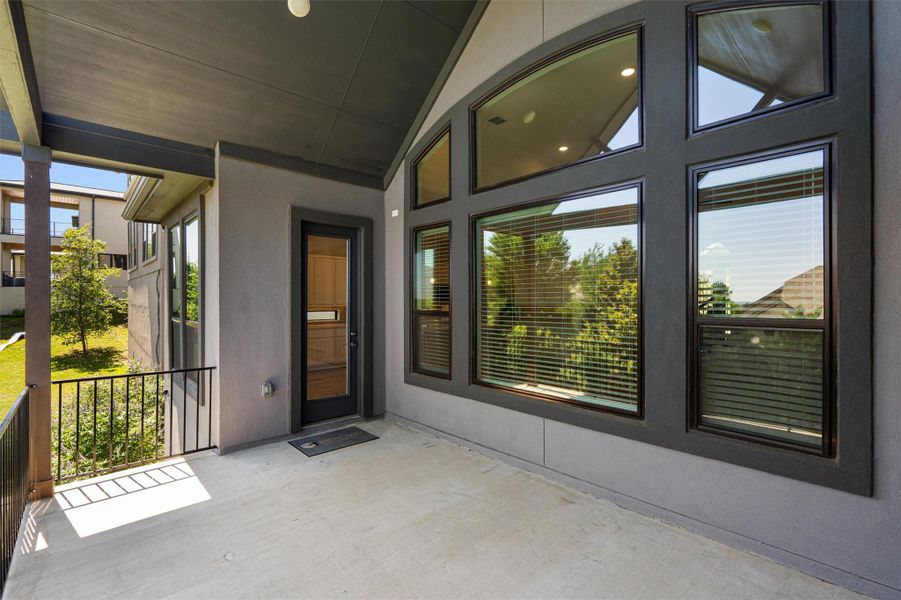 Covered outdoor patio with a concrete surface