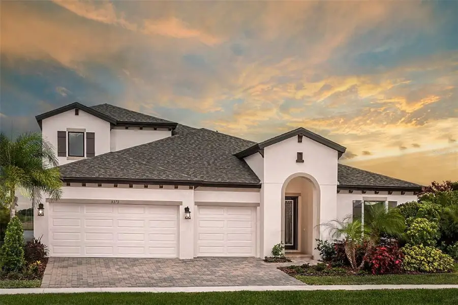 Front exterior of a new home in Waterset, Apollo Beach, FL, highlighting curb appeal (Image 1). Front exterior of a new home in Waterset, Apollo Beach, FL, highlighting curb appeal (Image 1).