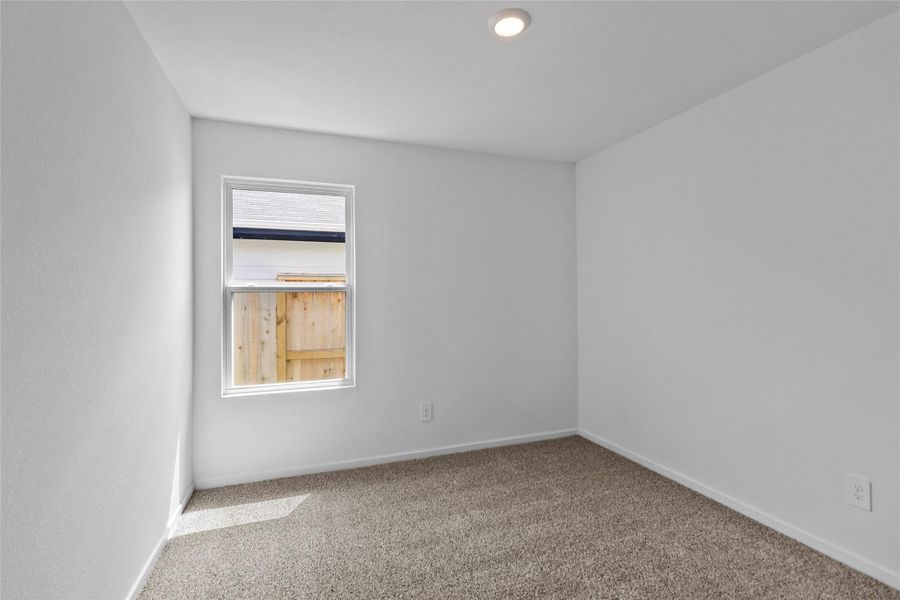 Spacious, unfurnished interior of a new home in The Canopies, Splendora (Image 23).