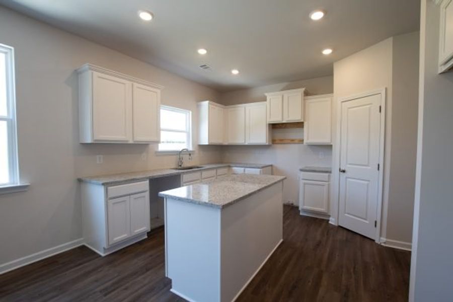 Representative furnished interior of a home built from the Fairfax by Piedmont Residential in Falls Creek, Flowery Branch (Image 4).