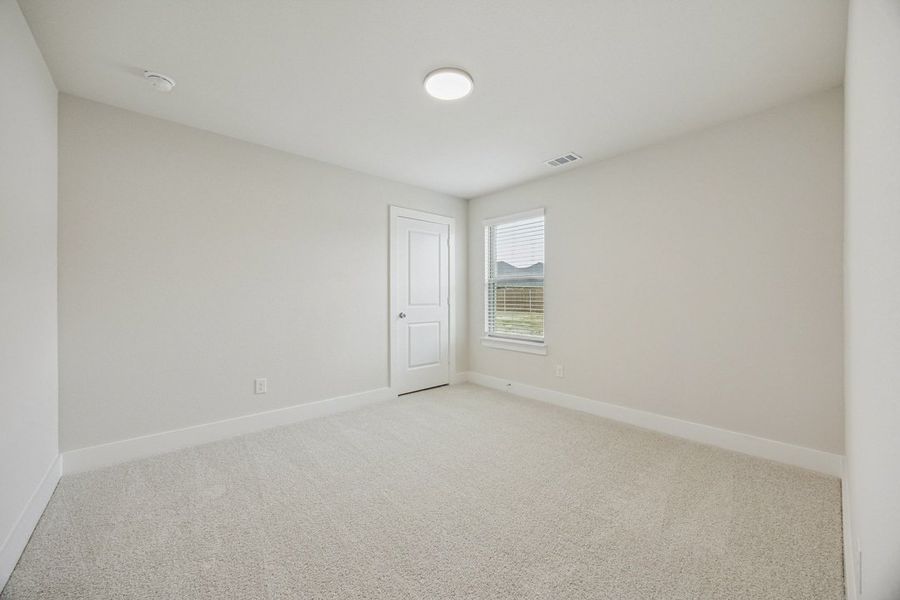 Representative unfurnished interior of a home built from the The Jason by Lillian Custom Homes in Hickory Hill, Sherman (Image 30).