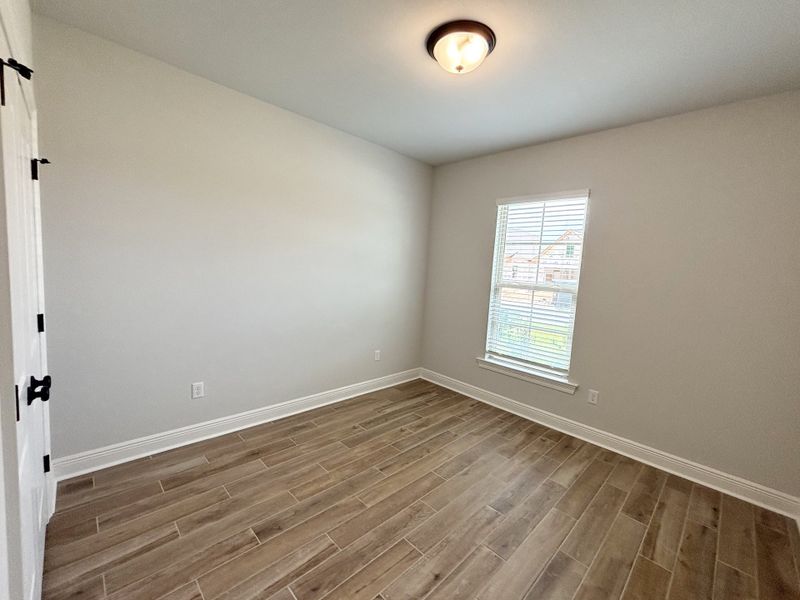 Spacious, unfurnished interior of a new home in Bird Song at Hammock Bay, Freeport (Image 25).