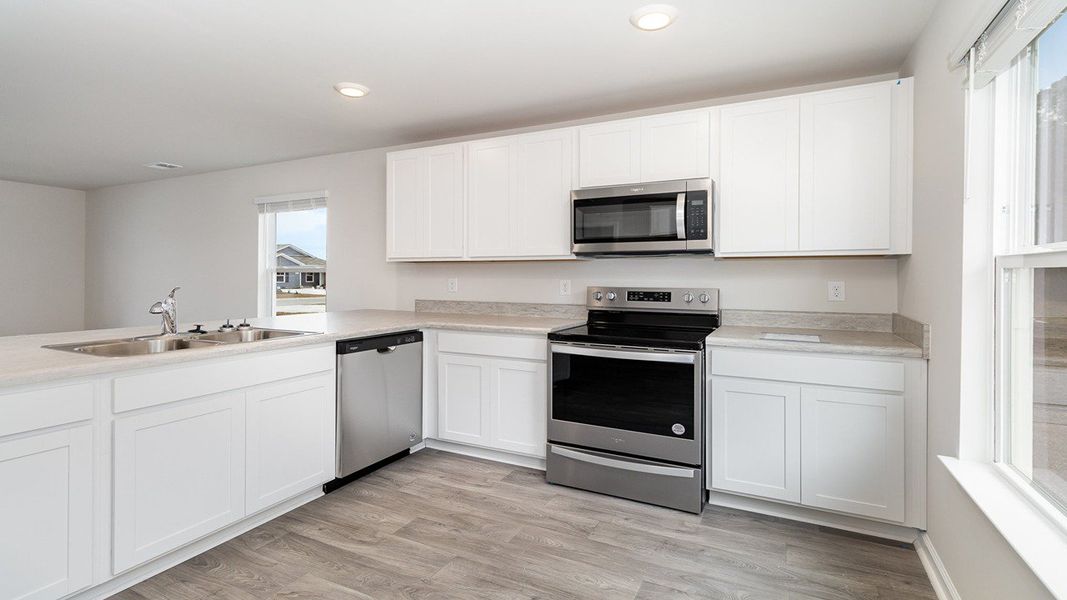 Furnished interior view inside a new home in Sandpiper Place, Myrtle Beach (Image 4).