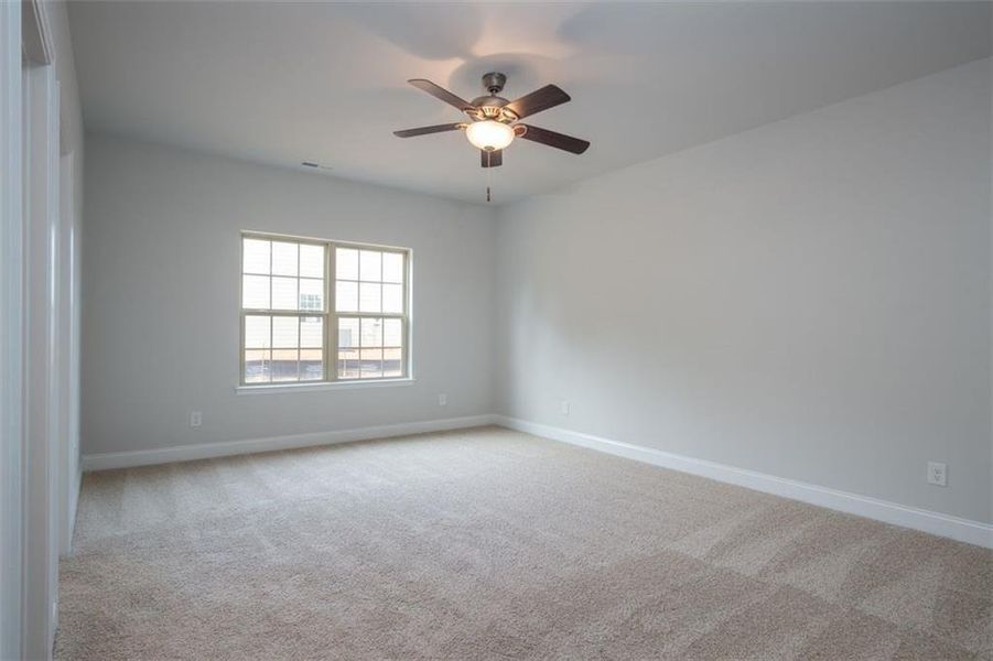 Spacious, unfurnished interior of a new home in Mirror Lake at South Harbour, Villa Rica (Image 14).