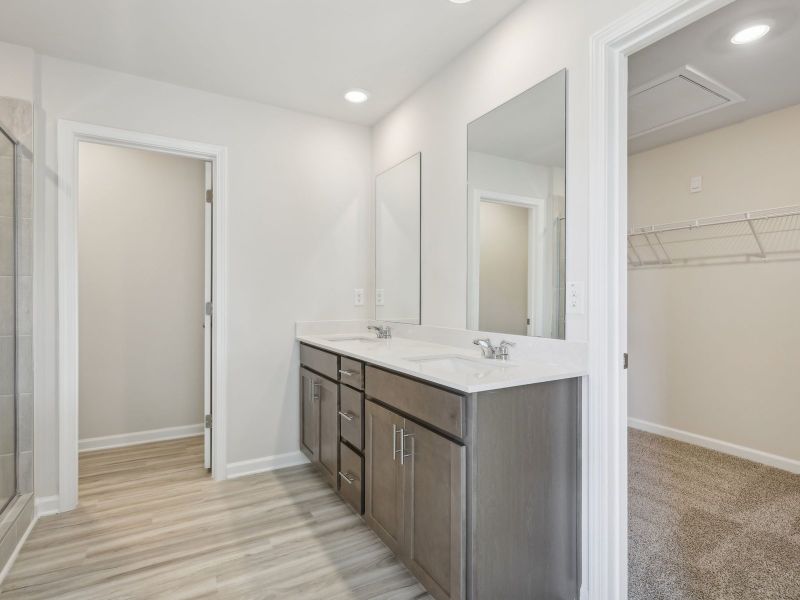 Furnished interior view inside a new home in Northwoods at Mirror Lake, Villa Rica (Image 7).
