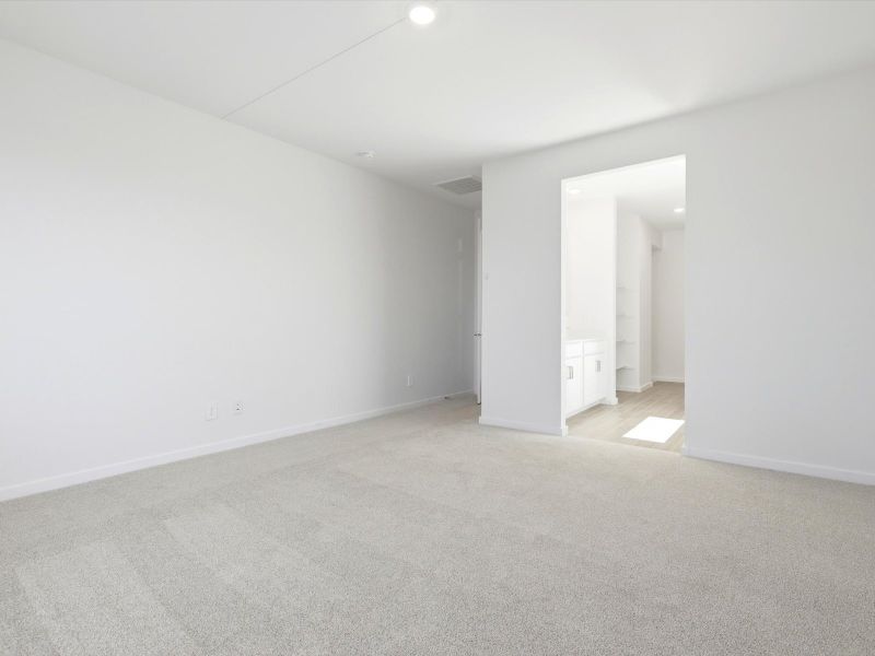 Spacious, unfurnished interior of a new home in White Tank Foothills Reserve Series, Waddell (Image 16).