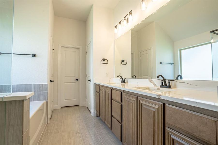 Primary bedroom offers an ensuite three piece bath with large walk-in closet. Primary bedroom offers an ensuite three piece bath with large walk-in closet.