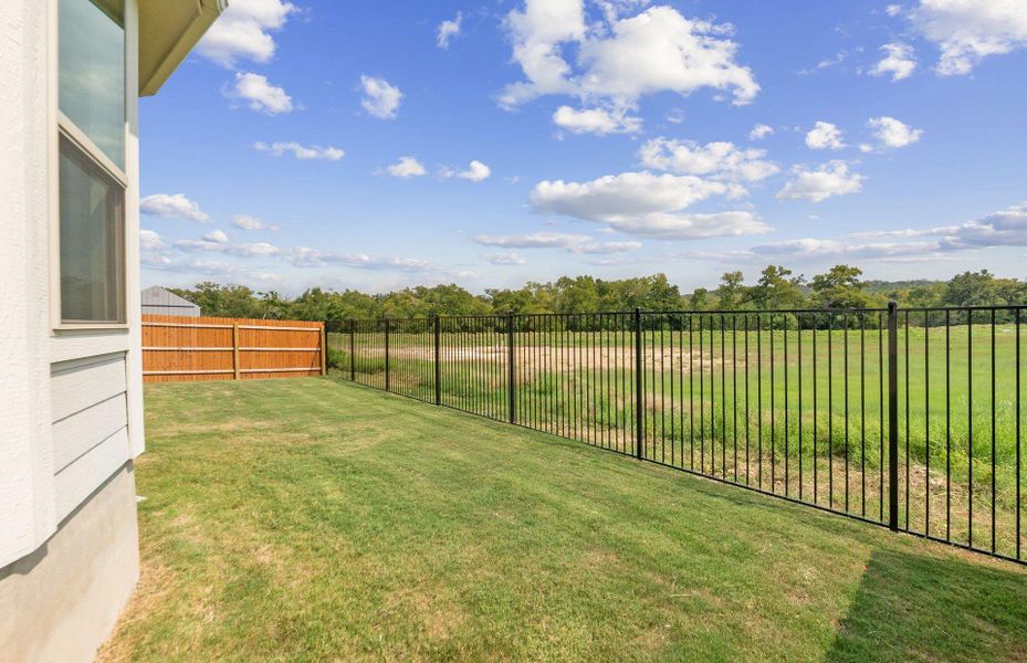 Exterior details and patio area of a home in Saddleback at Santa Rita Ranch, Liberty Hill (Image 22). Exterior details and patio area of a home in Saddleback at Santa Rita Ranch, Liberty Hill (Image 22).