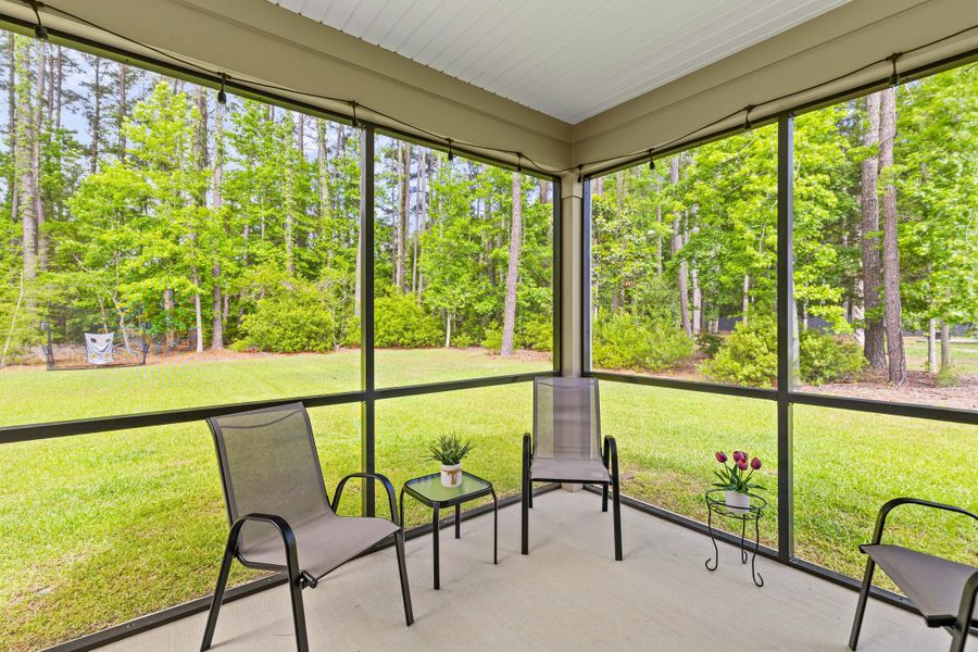 Exterior details and patio area of a home in , Johns Island (Image 28).