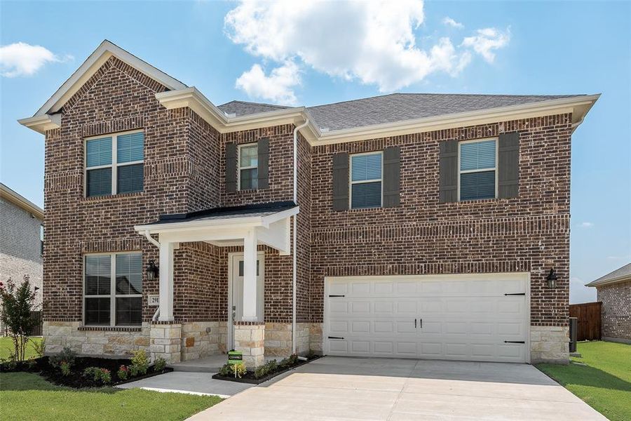 Front exterior of a new home in Walden Pond, Forney, TX, highlighting curb appeal (Image 18). Front exterior of a new home in Walden Pond, Forney, TX, highlighting curb appeal (Image 18).