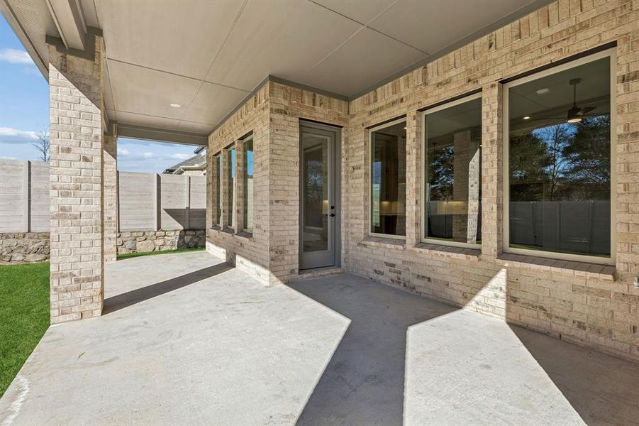 Exterior details and patio area of a home in Painted Tree Lakeside, McKinney (Image 4).