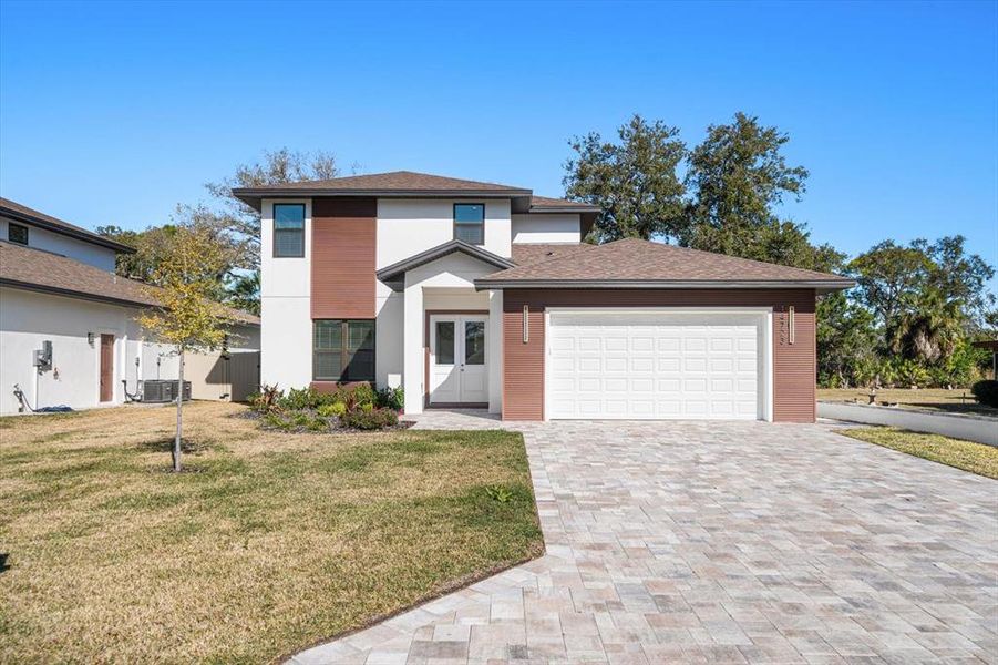 Front exterior of a new home in , Largo, FL, highlighting curb appeal (Image 29).
