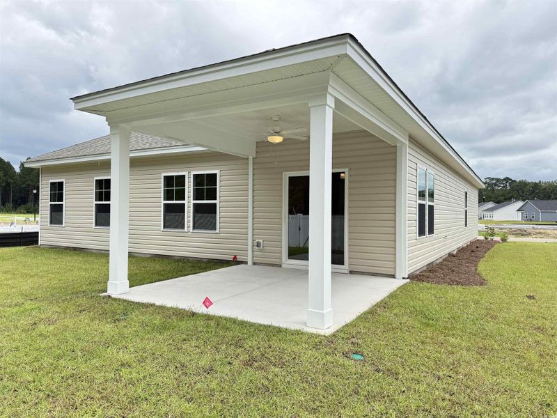 Front exterior of a new home in Beach Gardens, Conway, SC, highlighting curb appeal (Image 2).