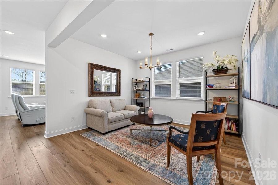 Large dining/sitting room off the front entry hallway and around the corner from the kitchen.