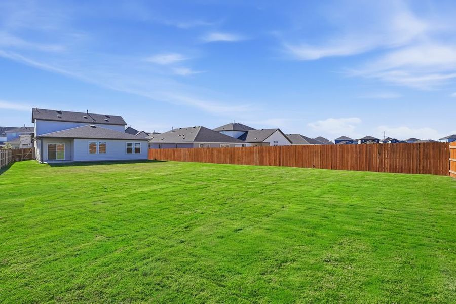 Exterior details and patio area of a home in Emory Crossing 50s, Hutto (Image 4).