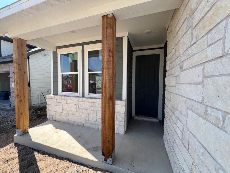 Exterior details and patio area of a home in Rolling Glen, Hutto (Image 15).