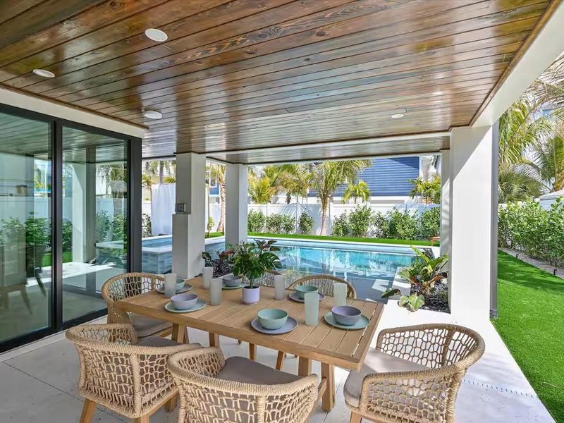 Exterior details and patio area of a home in , Bradenton Beach (Image 28).