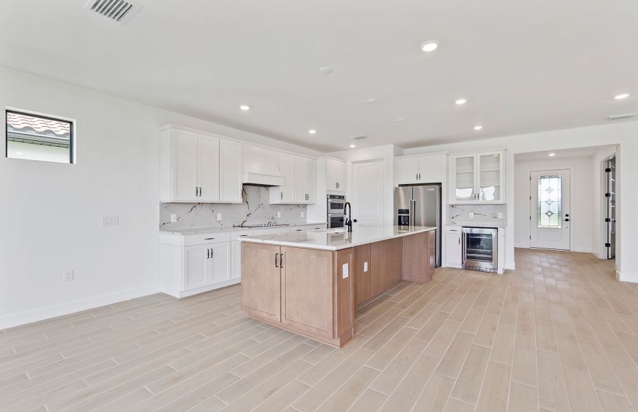 Furnished interior view inside a new home in Del Webb Naples, Ave Maria (Image 7).
