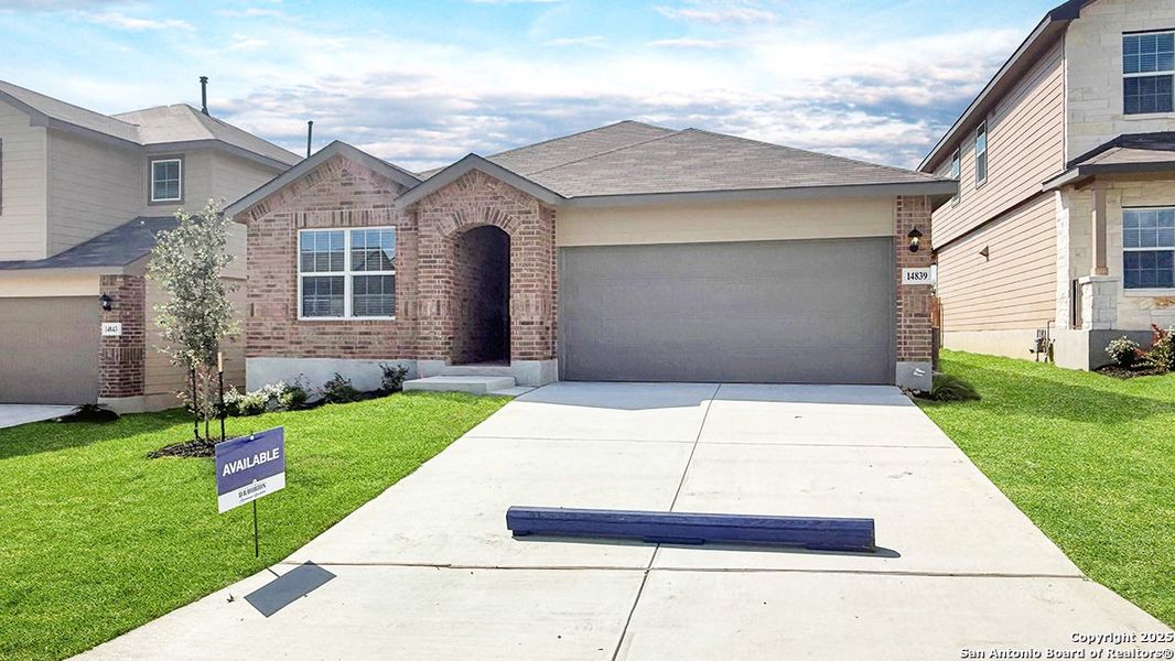 Front exterior of a new home in Stonehill, San Antonio, TX, highlighting curb appeal (Image 1). Front exterior of a new home in Stonehill, San Antonio, TX, highlighting curb appeal (Image 1).