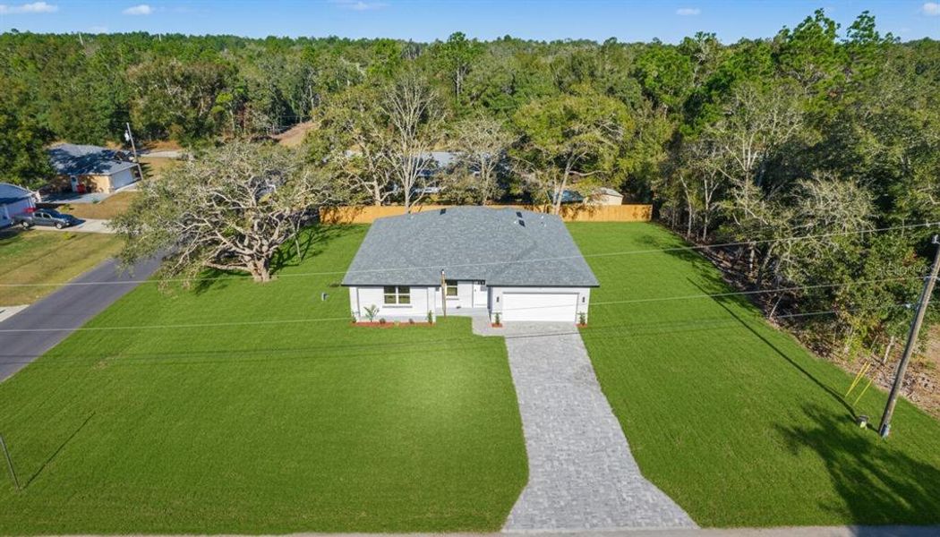 Front exterior of a new home in , Citrus Springs, FL, highlighting curb appeal (Image 20).