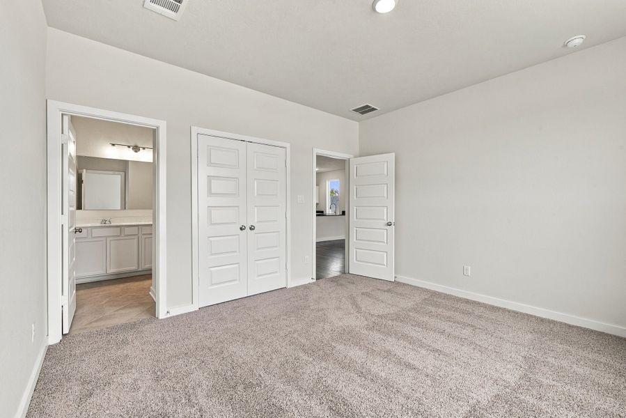 Spacious, unfurnished interior of a new home in The Cottages at Pagosa Springs, Bryan (Image 11).