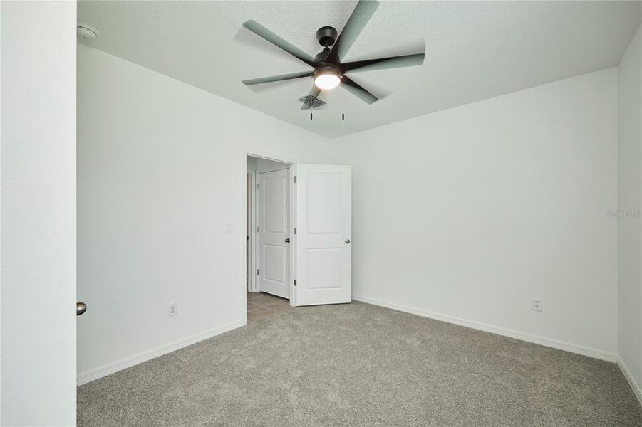 Spacious, unfurnished interior of a new home in Westgate at Avalon Park, Wesley Chapel (Image 41).