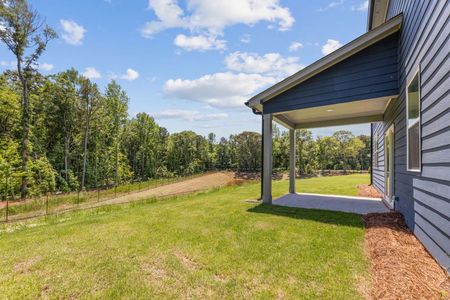A house with a grass yard. A house with a grass yard.