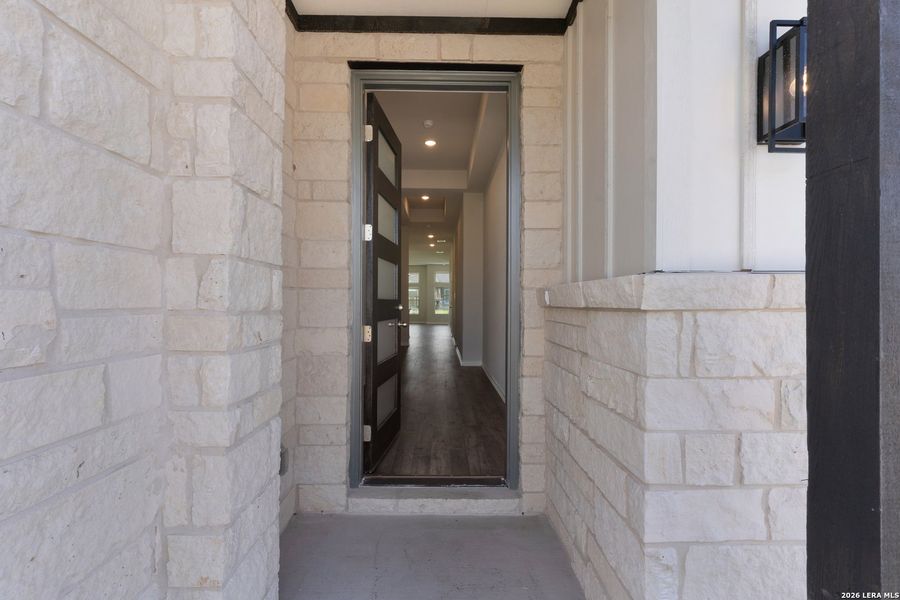 Exterior details and patio area of a home in The Crossvine, Schertz (Image 4).