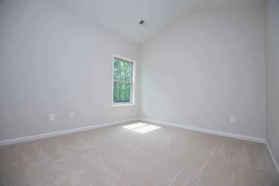 Spacious, unfurnished interior of a new home in WOODMONT RESERVE, Roopville (Image 64).