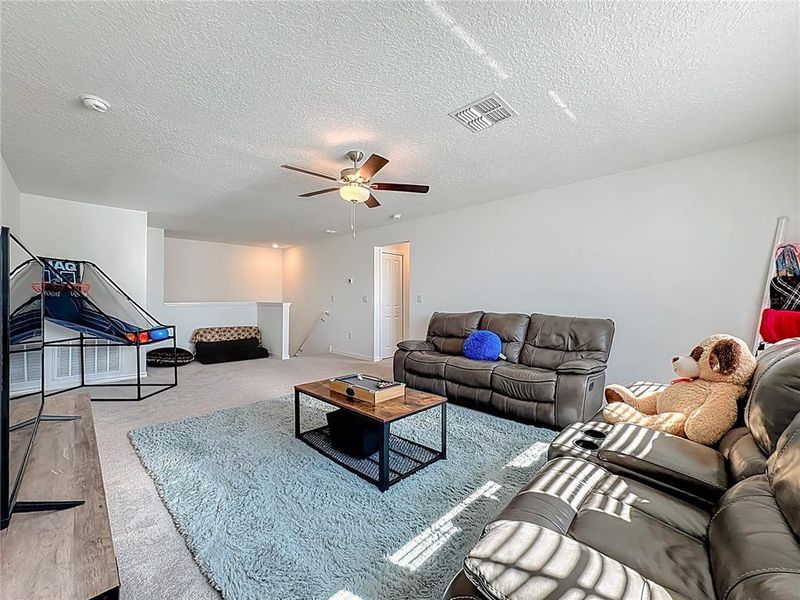 Furnished interior view inside a new home in Berry Bay: The Executives, Wimauma (Image 18).