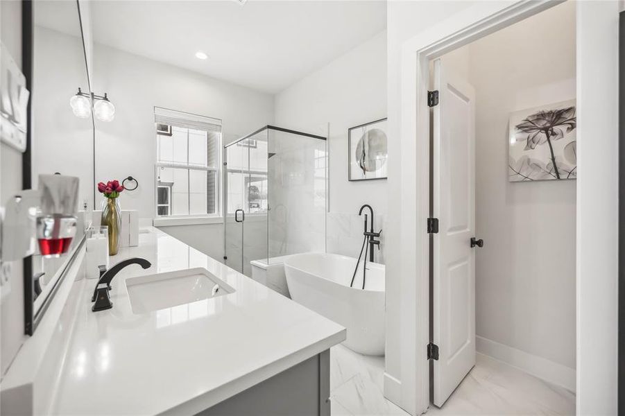 Another view of Primary Bathroom and enclosed toilet for privacy.