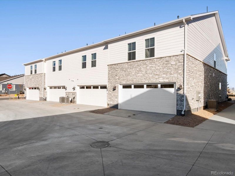 Exterior details and patio area of a home in Skyview at High Point, Aurora (Image 4).