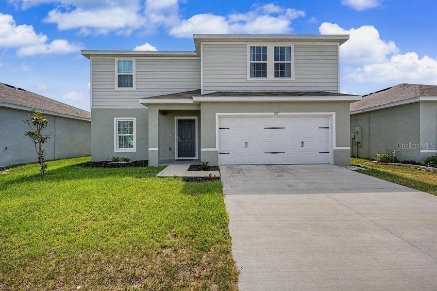 Front exterior of a new home in , Brooksville, FL, highlighting curb appeal (Image 22). Front exterior of a new home in , Brooksville, FL, highlighting curb appeal (Image 22).