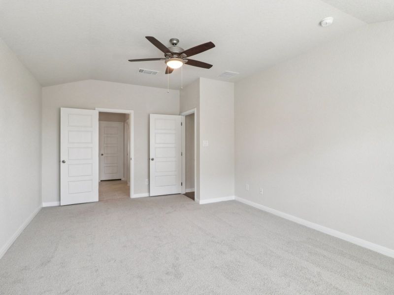 Primary suite in the Callaghan floorplan at a Meritage Homes community.