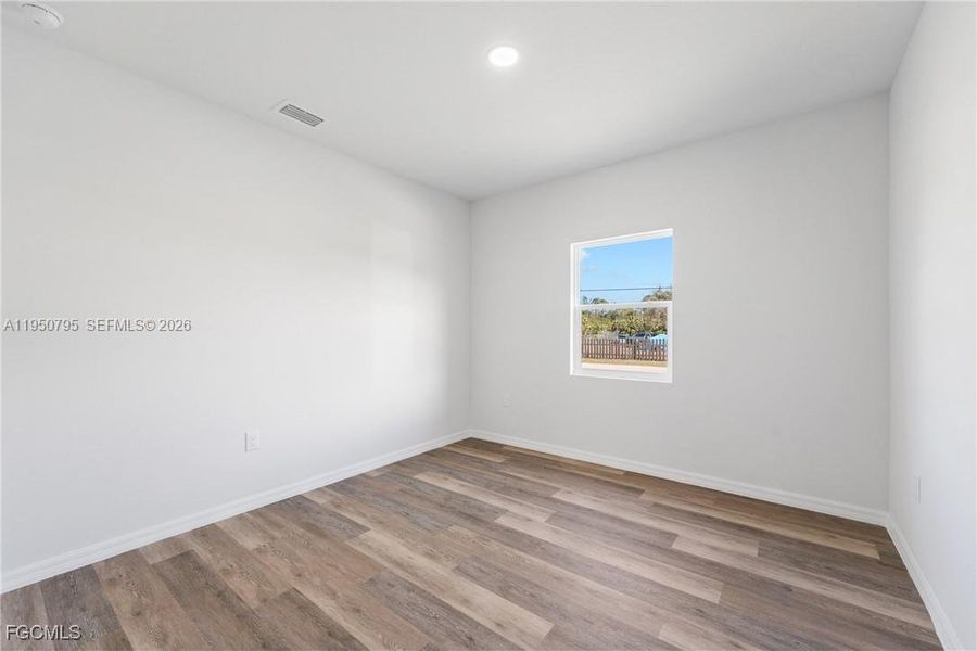 Spacious, unfurnished interior of a new home in , Lehigh Acres (Image 11).