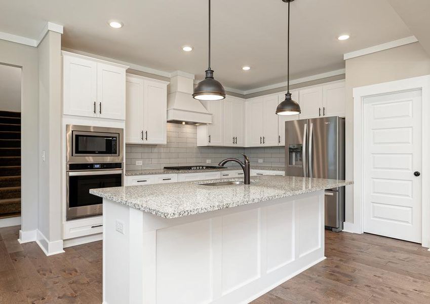 Kitchen with granite countertops.