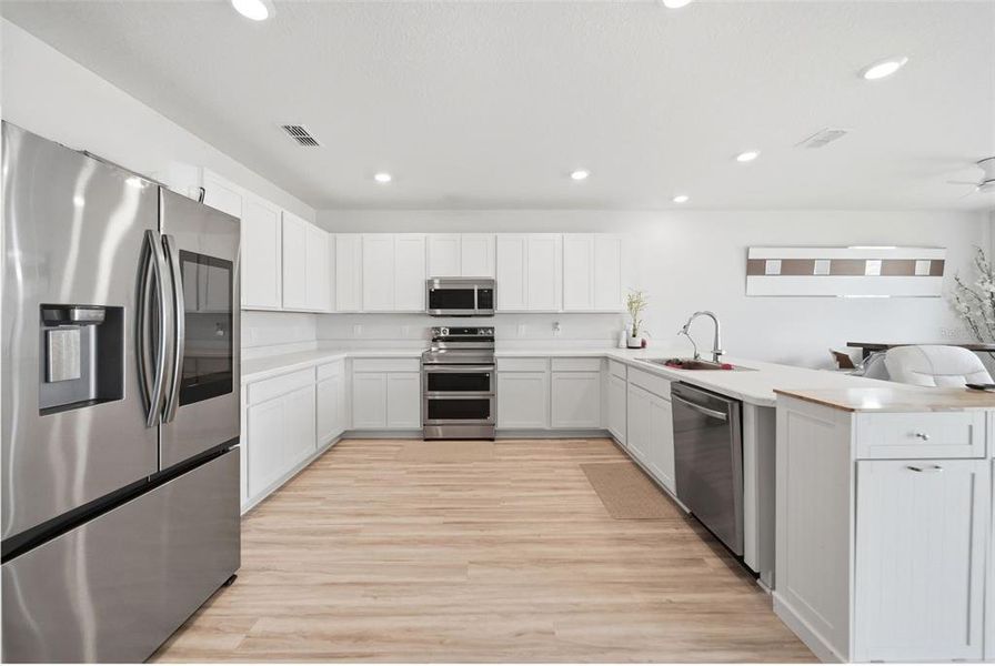 Furnished interior view inside a new home in , Haines City (Image 15).