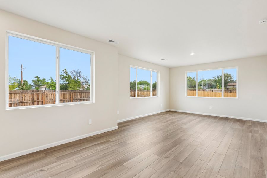 Spacious, unfurnished interior of a new home in Cherry Meadows, Brighton (Image 9).