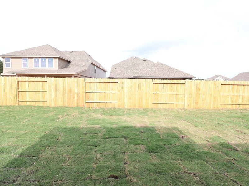 Front exterior of a new home in Sorella, Tomball, TX, highlighting curb appeal (Image 11).