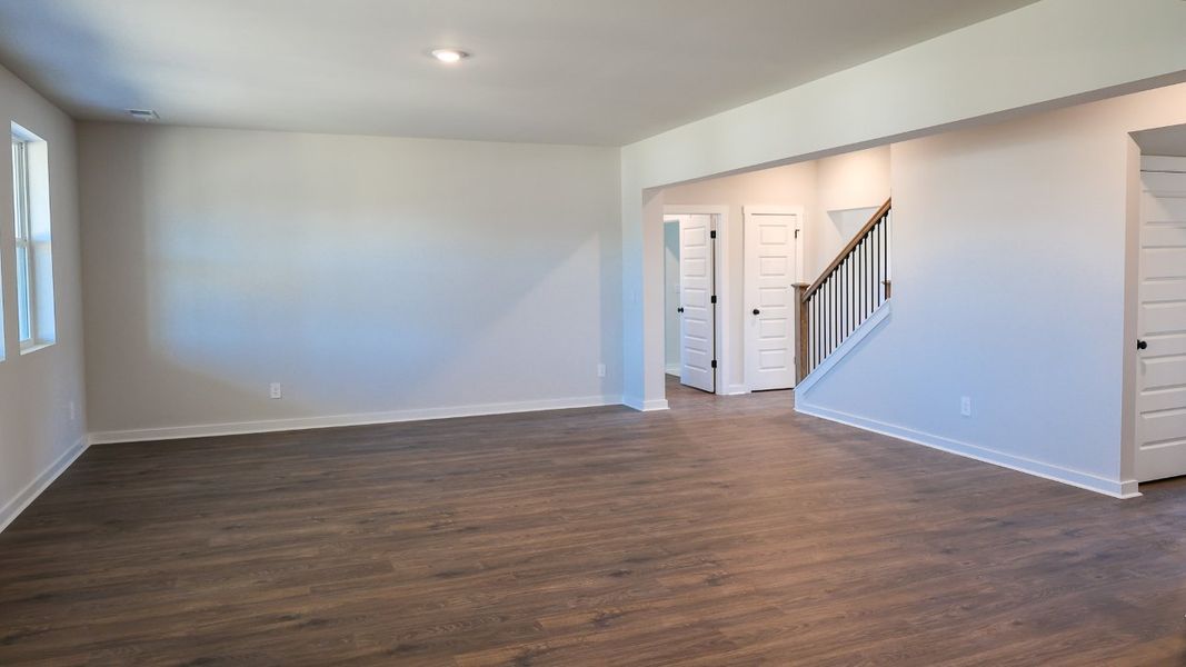 Representative unfurnished interior of a home built from the TISDALE by D.R. Horton in Harvest Point, Spring Hill (Image 32).