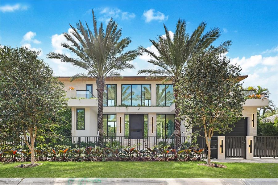 Front exterior of a new home in , Miami, FL, highlighting curb appeal (Image 1). Front exterior of a new home in , Miami, FL, highlighting curb appeal (Image 1).
