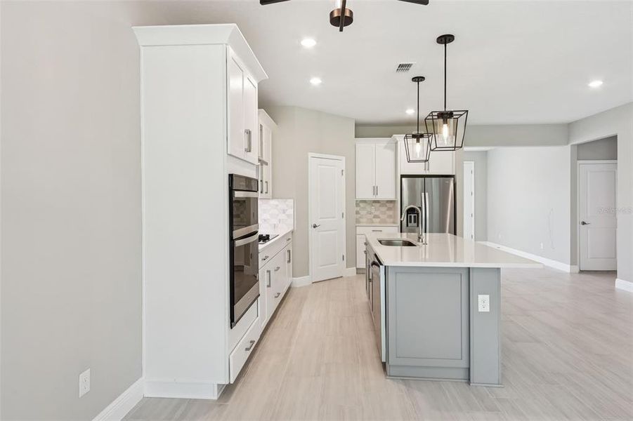 Furnished interior view inside a new home in Legends Preserve - Signature Series, Daytona Beach (Image 13).