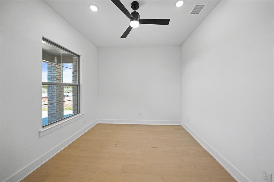 Unfurnished room with light wood finished floors, recessed lighting, and ceiling fan