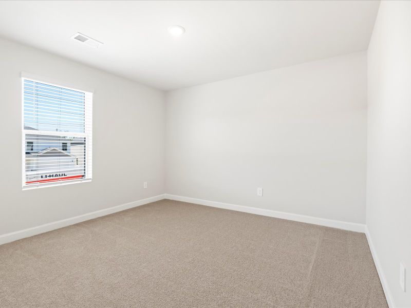 Spacious, unfurnished interior of a new home in The Farm at Wells Creek - Signature Collection, Gray Court (Image 20).