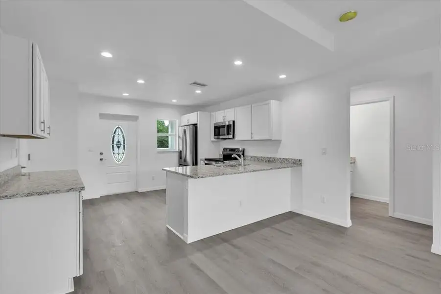 Furnished interior view inside a new home in , Punta Gorda (Image 6).