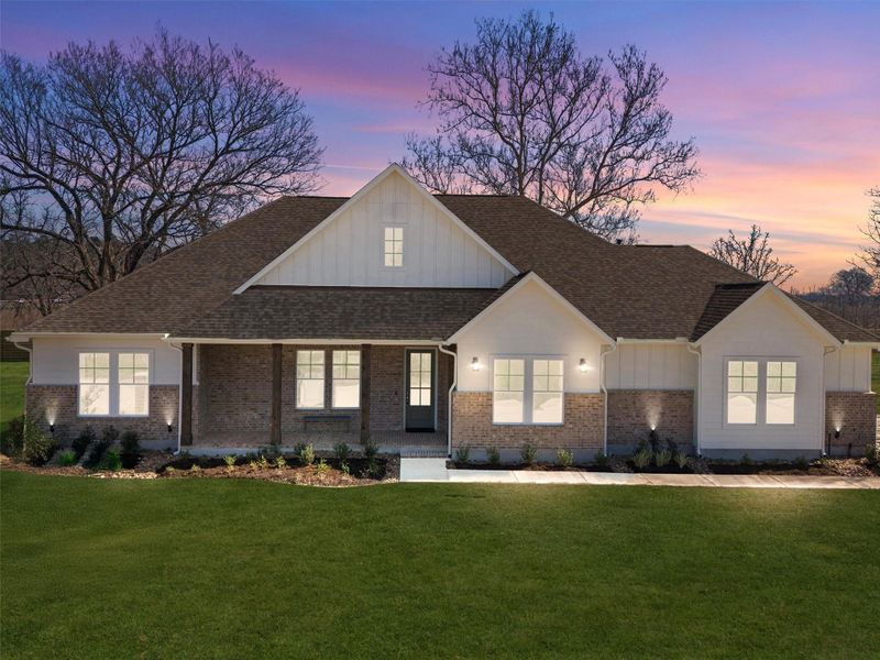 Front exterior of a new home in , Smithville, TX, highlighting curb appeal (Image 22).