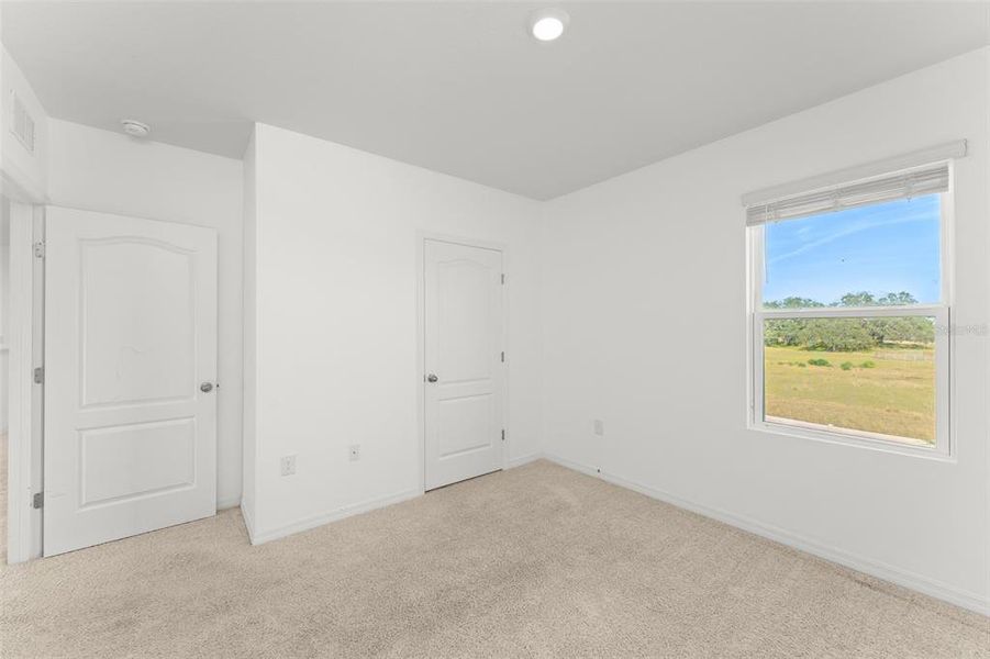 Spacious, unfurnished interior of a new home in Grace Ranch, Haines City (Image 40). Spacious, unfurnished interior of a new home in Grace Ranch, Haines City (Image 40).