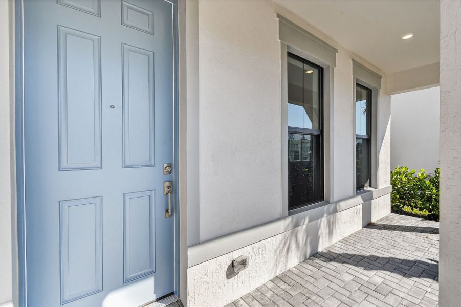 Exterior details and patio area of a home in Hendrix Reserve, Lake Worth (Image 24).